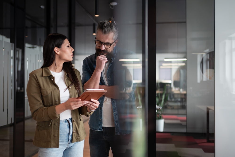 IT professionals reviewing a digital transformation strategy for legacy enterprise applications

